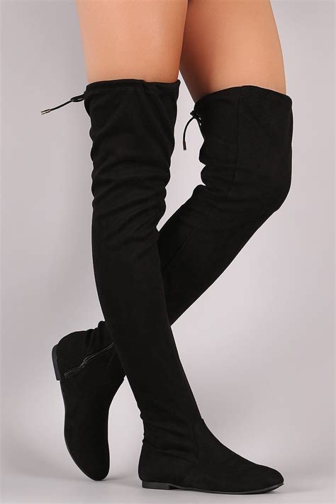 suede knee high flat boots.